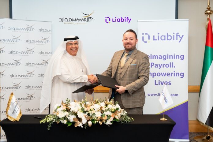 Rashid Al Qubaisi, CEO of Mawarid Finance, and Allan Villegas, CEO of Liabify, at the signing ceremony during the Mawarid FinTech & Innovation Summit at the Grand Hyatt, Dubai.